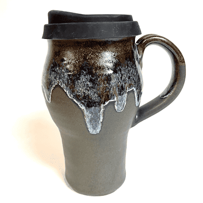16 oz. tree beard travel mug handle with lid on top